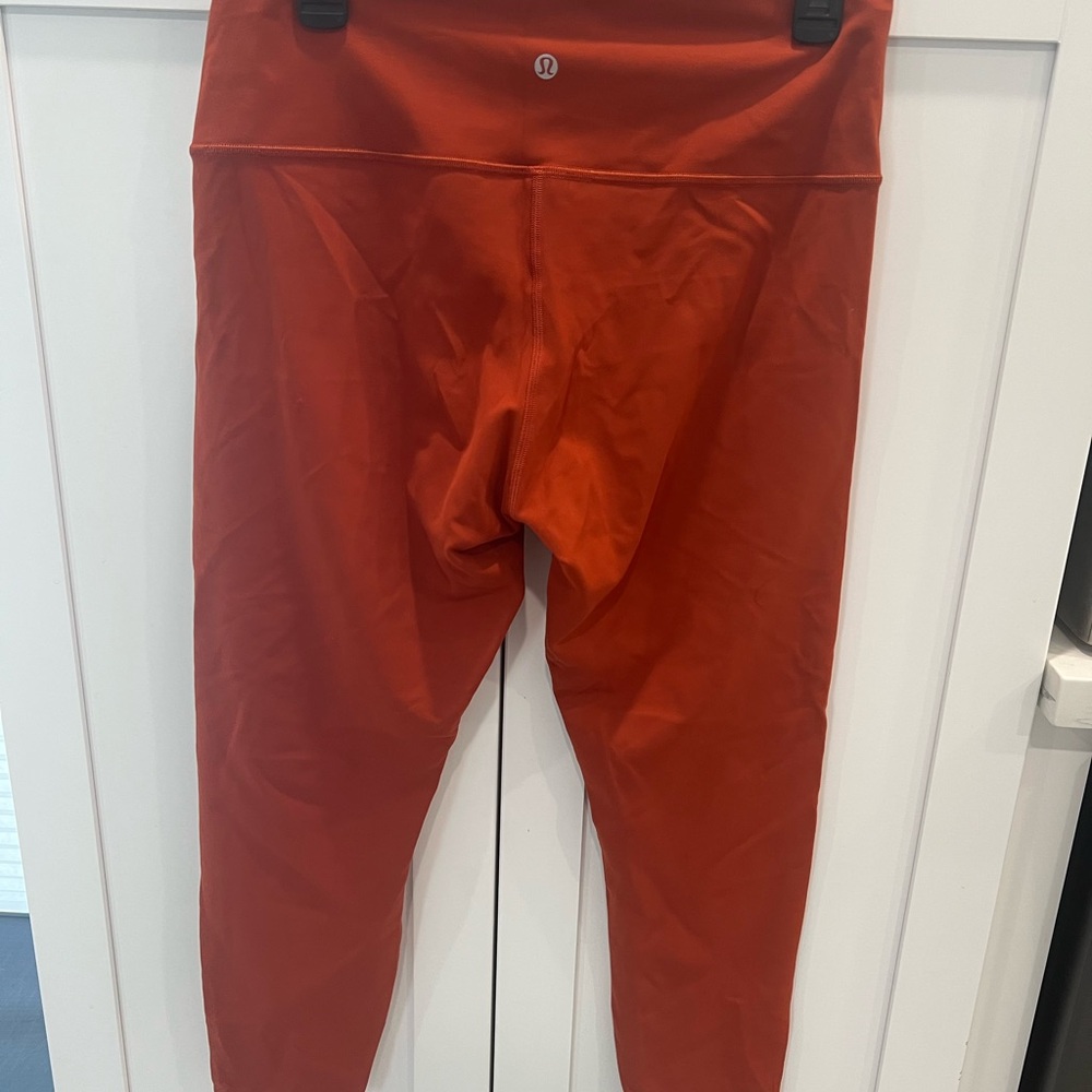 Lululemon Athletica Orange Leggings for Dynamic Performance